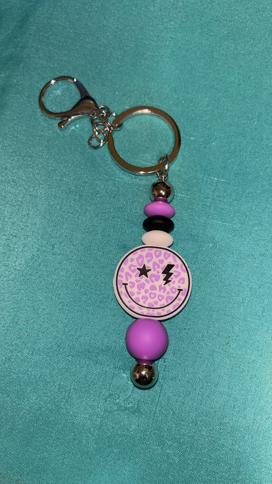 Purple Smiley Face Bar Keychain